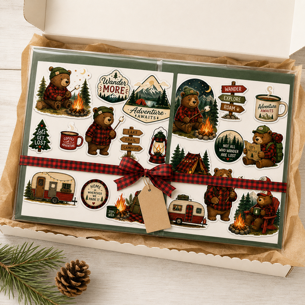 Gift-ready two-sheet Camping Bear Adventure sticker collection in clear sleeves with forest-green backing and red plaid ribbon.