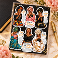Six Faith Sisters praying women scripture stickers styled on ivory with black journal, gold pen and blush flowers