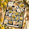 Gilded Wildflower floral journal sticker sheet in sunny lifestyle desk scene
